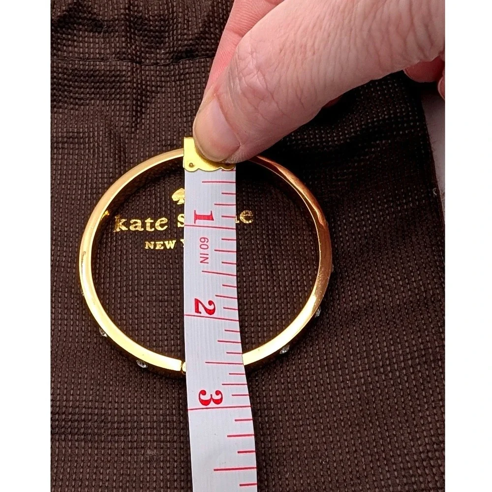 Kate Spade Gold Tone Crystal Hinged Bangle Bracelet with Dust Bag